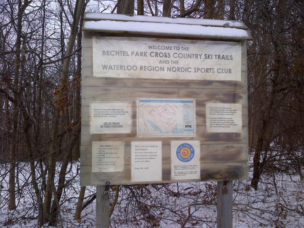 The sign leading into the woodlot of Bechtel Park. 