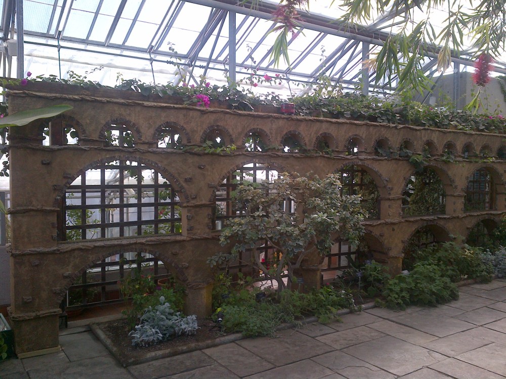 Arches in front of an arbor. 