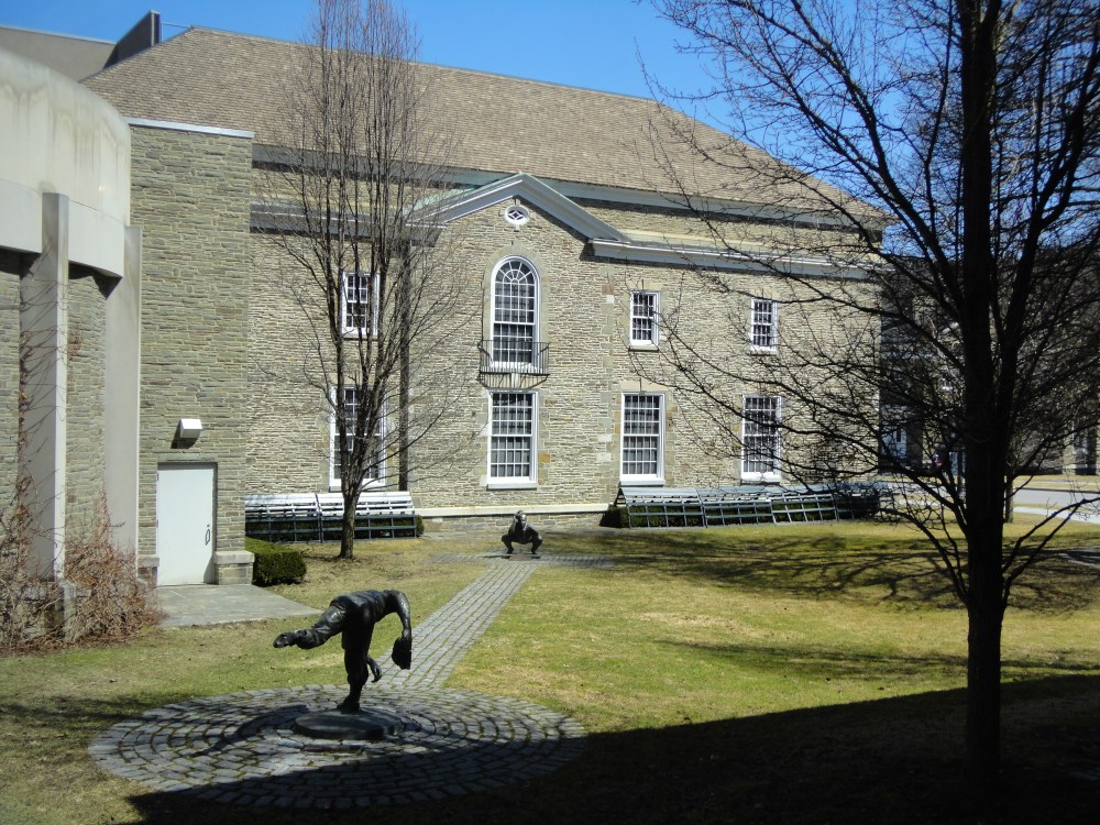 Statues play ball outside the Baseball Hall of Fame and Museum. 