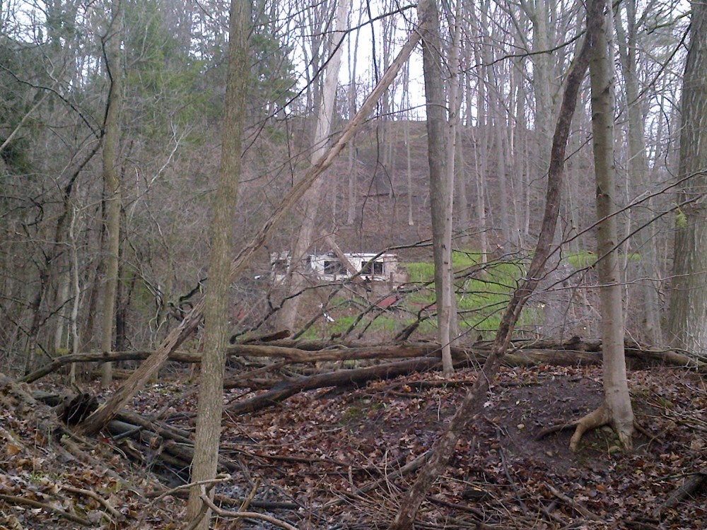 The creepy building along the banks of the river. 